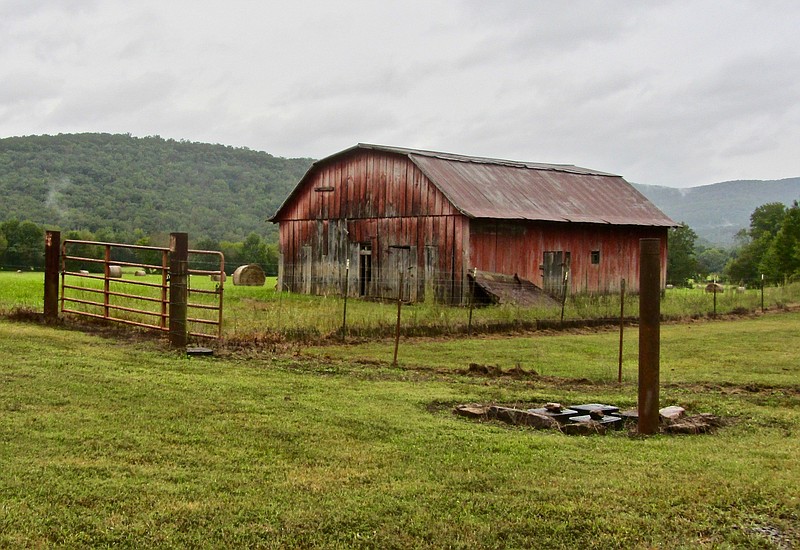 A weathered barn is a photogenic sight along Pig Trail Scenic Byway.