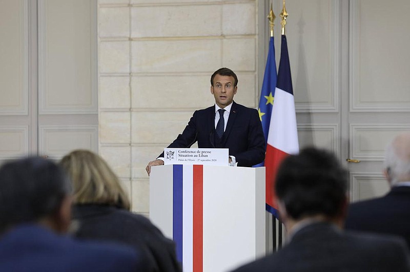 French President Emmanuel Macron speaks Sunday in Paris during a news conference about Leb- anon. (AP/Lewis Joly) 