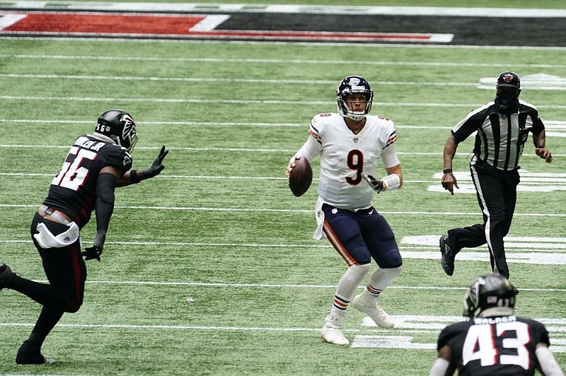 Backup quarterback Nick Foles threw three fourth-quarter touch- down passes to lift the Chicago Bears to a 30-26 victory over the Atlanta Falcons on Sunday in Atlanta. The Bears are 3-0 for the first time since 2013. 
(AP/Brynn Anderson) 