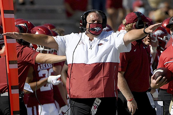 Arkansas football coach Sam Pittman is shown during a game against Georgia on Saturday, Sept. 26, 2020, in Fayetteville. (AP Photo/Michael Woods)