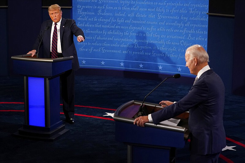 President Donald Trump and Democratic presidential candidate former Vice President Joe Biden during the first presidential debate Tuesday, Sept. 29, 2020, at Case Western University and Cleveland Clinic, in Cleveland, Ohio. (AP Photo/Julio Cortez)