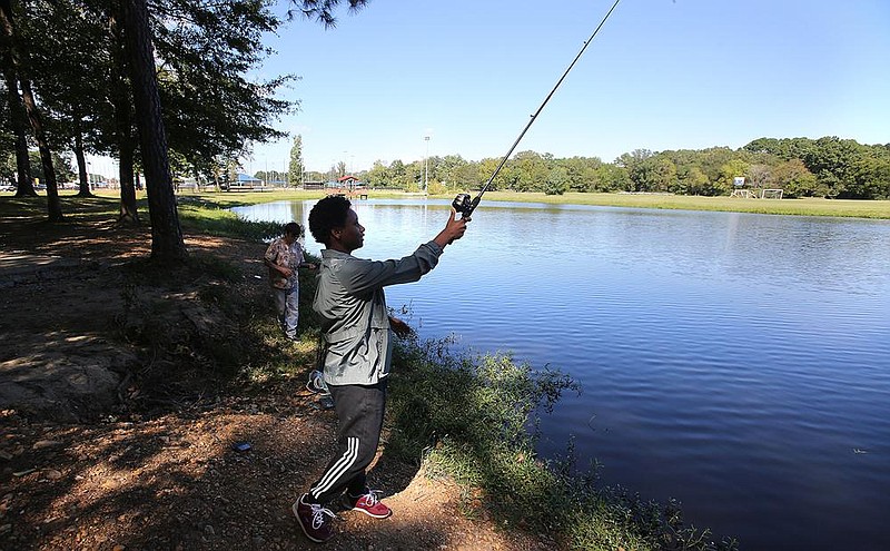 Rachael Dyer of Benton casts her line into the water while fishing at Lake Charles on Tuesday, Sept. 29, 2020, at Bishop Park in Bryant. 
(Arkansas Democrat-Gazette/Thomas Metthe)
