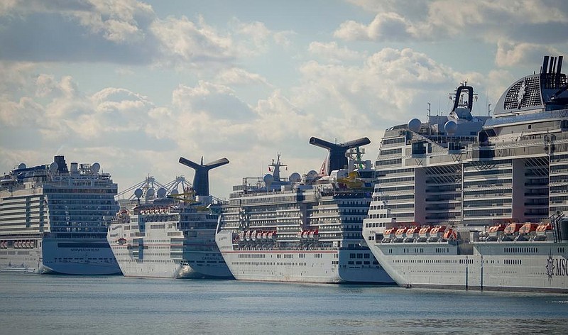 Cruise ships sit at the Port of Miami in April after being docked to stop further ship-borne coronavirus outbreaks. A new Centers for Disease Control and Prevention order to keep cruise ships docked until mid-February was overruled Wednesday by the White House coronavirus task force. The ships will now be allowed to sail after Oct. 31 under a voluntary industry plan.
(The New York Times/Angel Valentin)