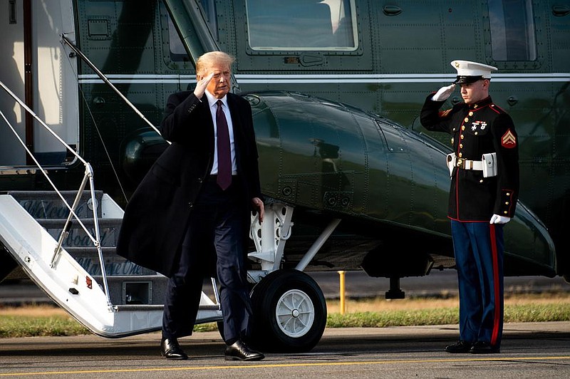 President Donald Trump heads to Air Force One at Morristown Airport in Morristown, N.J., on Thursday, after a fundraiser at Trump National Golf Club Bedminster.
(The New York TImes/Erin Schaff)