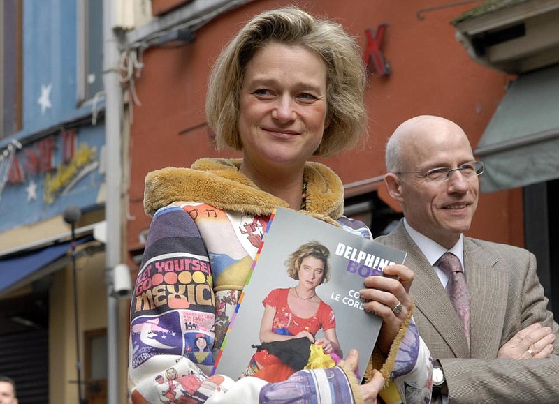 In this April 2008 file photo, Delphine Boel, poses for photographers with her book "Cutting the Umbilical Cord" in Brussels. 
(AP Photo/Thierry Charlier, File)