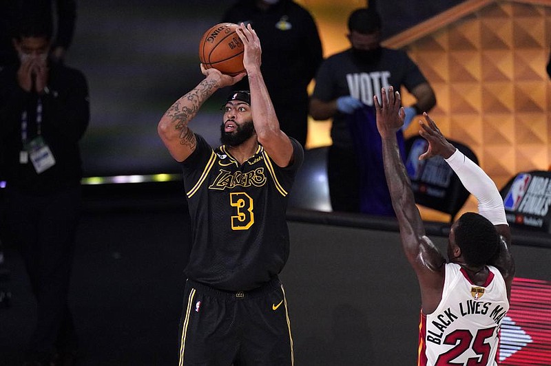 Anthony Davis scored 32 points and grabbed 14 rebounds in the Los Angeles Lakers’ 124-114 victory over the Miami Heat in Game 2 of the NBA Finals on Friday night.
(AP/Mark J. Terrill)