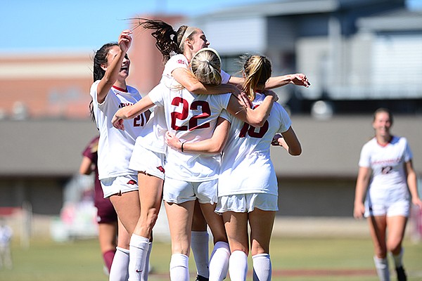 Arkansas players celebrate after Parker Goins (22) scored a goal during a game against Texas A&M on Sunday, Oct. 4, 2020, in Fayetteville. 