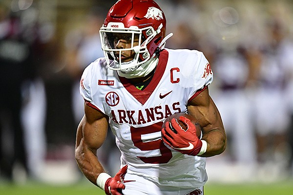 Arkansas running back Rakeem Boyd carries the ball during a game against Mississippi State on Saturday, Oct. 3, 2020, in Fayetteville. 
