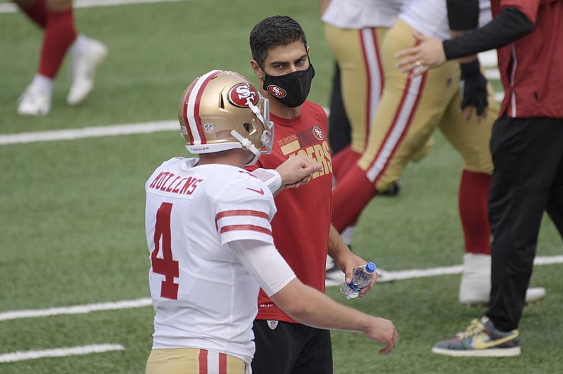 Quarterback Jimmy Garoppolo (right) will not play again today for the San Francisco 49ers. He will be replaced by Nick Mullens (4).
(AP/Bill Kostroun)