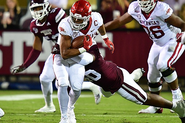 Arkansas running back Rakeem Boyd carries the ball during a game against Mississippi State on Saturday, Oct. 3, 2020, in Fayetteville.