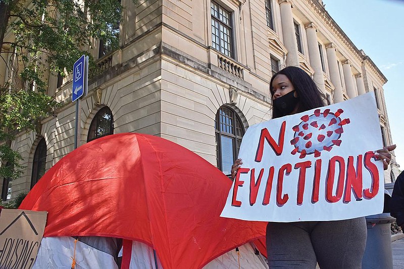 FILE — Alexis Palmer participates in a protest outside the Pulaski County Courthouse in Little Rock against evictions for nonpayment of rent in this Oct. 1, 2020 file photo.
(Arkansas Democrat-Gazette/Staci Vandagriff)