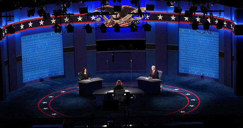 Democratic vice presidential candidate Kamala Harris and Vice President Mike Pence face off in their debate Wednesday at the University of Utah in Salt Lake City. More photos at arkansasonline.com/108vp/.
(The New York Times/Erin Schaff)