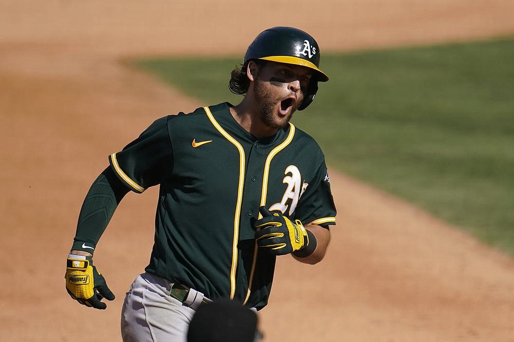 Oakland Athletics' Josh Reddick reacts after grounding out to