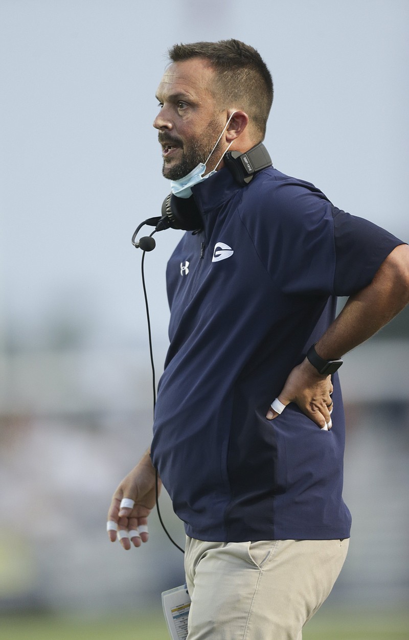 FILE -- Greenwood head coach Chris Young looks on, Friday, September 18, 2020 during a football game at Greenwood High School in Greenwood. (NWA Democrat-Gazette/Charlie Kaijo)