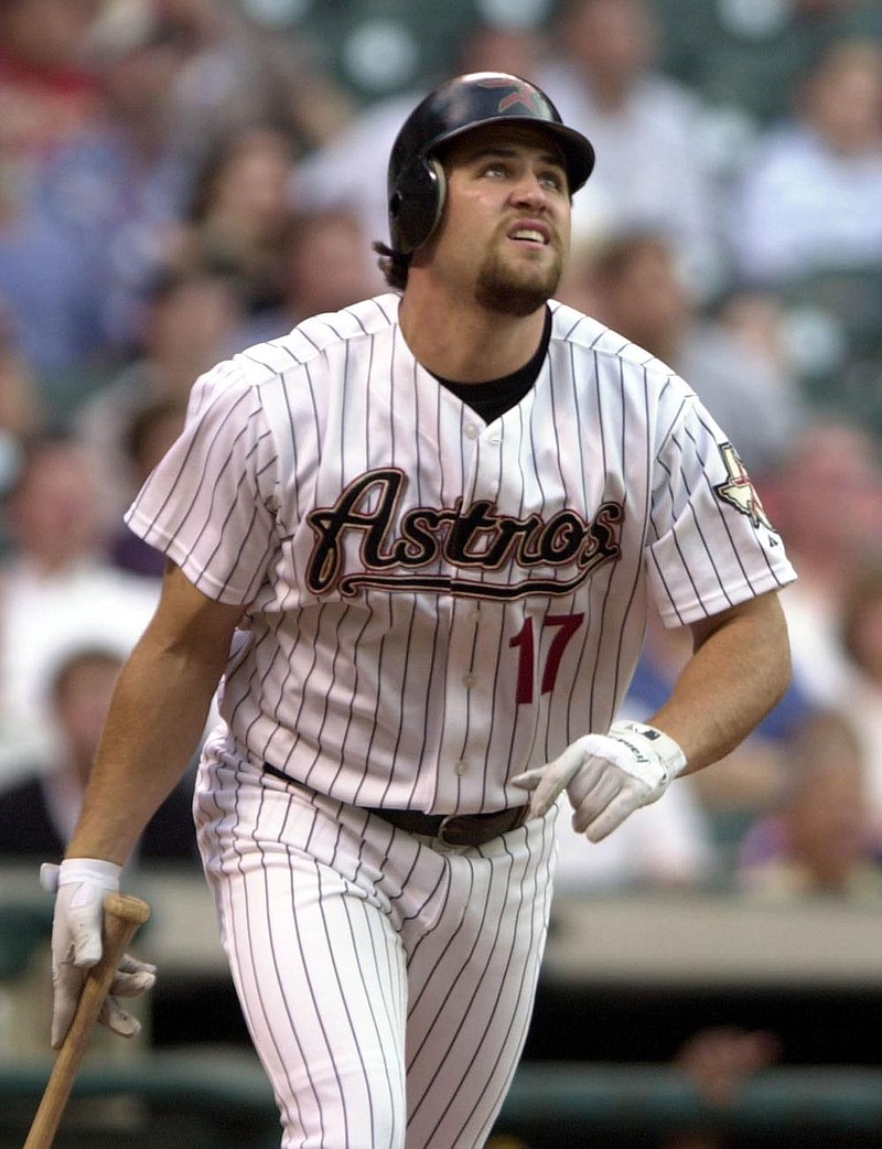 Houston’s Lance Berkman (shown) and Atlanta’s Adam LaRoche hit grand slams on this date in 2005, but the Astros outlasted the Braves 7-6 in 18 innings to win the National League division series.
(AP file photo)