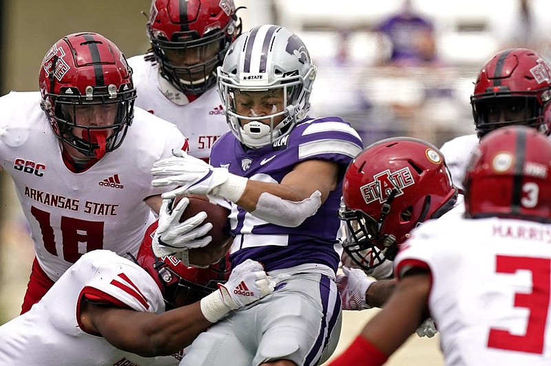 Arkansas State’s defense, shown during the Red Wolves’ victory  at Kansas State on Sept. 12, has struggled stopping opponents  on third down since that game.
(AP/Charlie Riedel)