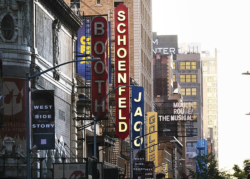 Theaters like these on 45th Street in New York will remain quiet a while longer, with shows not expected to resume until at least late May.
(AP)