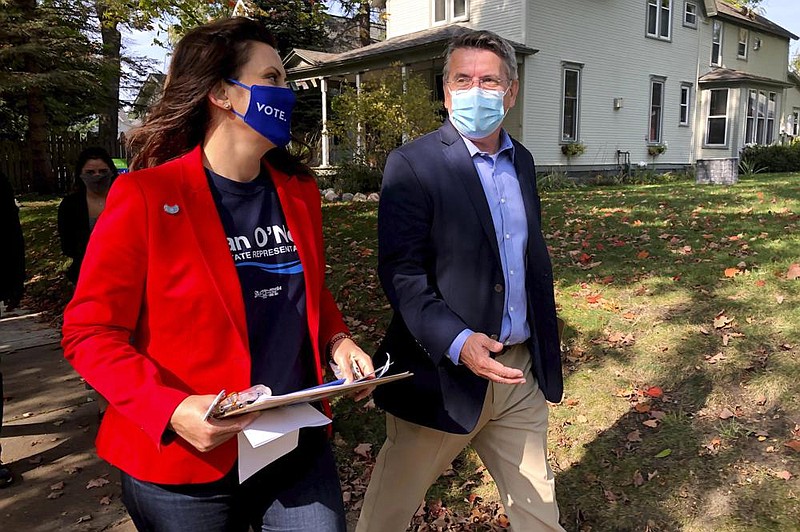 Michigan Gov. Gretchen Whitmer campaigns Friday with Dan O’Neil, a Democratic candidate for the Michigan House in Traverse City, Mich.
(AP/John Flesher)