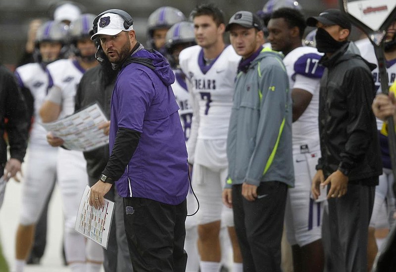 Central Arkansas head coach Nathan Brown checks the spot of the ball during the second quarter of the of UCA's 50-27 loss to Arkansas State on Saturday, Oct. 10, 2020, at Centennial Bank Stadium in Jonesboro. 
(Arkansas Democrat-Gazette/Thomas Metthe)