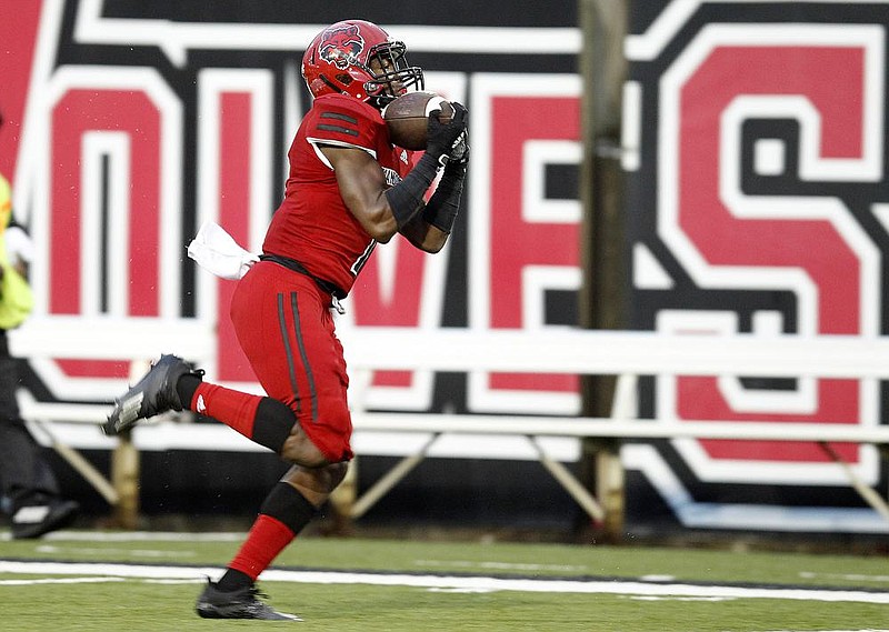Arkansas State wide receiver Corey Rucker (7) races to the end zone for a 56-yard touchdown reception in the fourth quarter of the Red Wolves' 50-27 win on Saturday, Oct. 10, 2020, at Centennial Bank Stadium in Jonesboro.
(Arkansas Democrat-Gazette/Thomas Metthe)