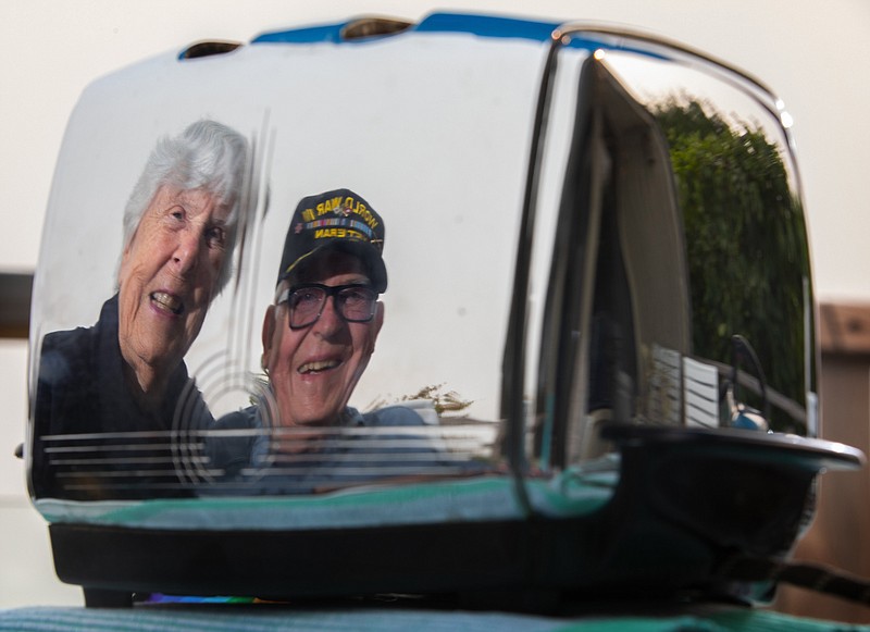 Gloria and Frank Witt, married for 71 years, are reflected Sept. 16 in a toaster they received as a wedding present 71 years ago.  (TNS/The Seattle Times/Ellen M. Banner)