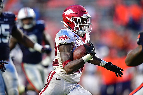 Arkansas running back Trelon Smith carries the ball during a game against Auburn on Saturday, Oct. 10, 2020, in Auburn, Ala.
