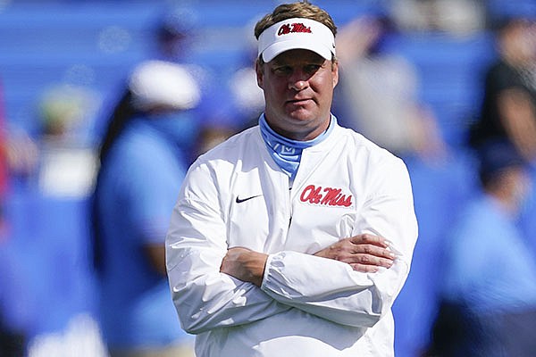 Ole Miss head coach Lane Kiffin watches his team warm up before an NCAA college football game against Kentucky, Saturday, Oct. 3, 2020, in Lexington, Ky. (AP Photo/Bryan Woolston)


