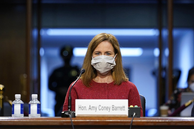 Supreme Court nominee Amy Coney Barrett listens during a confirmation hearing before the Senate Judiciary Committee, Tuesday, Oct. 13, 2020, on Capitol Hill in Washington.