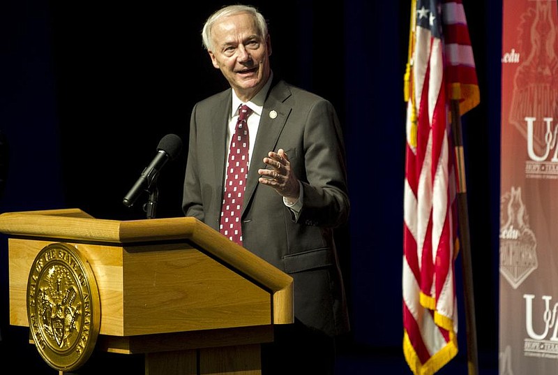 Governor Asa Hutchinson addresses the media from Hempstead Hall Theatre at the University of Arkansas Hope-Texarkana during his weekly update on Arkansas’ response to COVID-19 on Tuesday, Oct. 13. (Arkansas Democrat-Gazette/Stephen Swofford)
