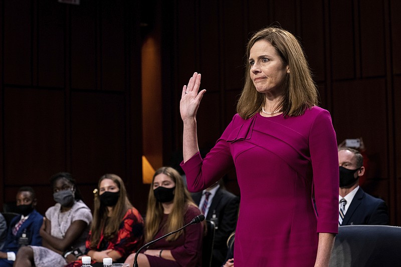 Supreme Court nominee Amy Coney Barrett is sworn in during her Senate Judiciary Committee confirmation hearing on Capitol Hill in Washington, Monday, Oct. 12, 2020. story.lead_photo.caption
