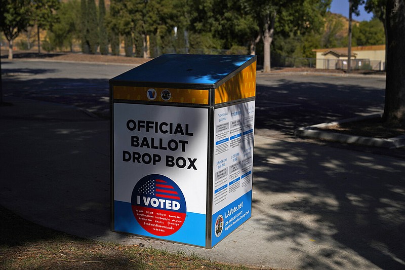 An official ballot drop box is seen in Santa Clarita, Calif., on Wednesday, Oct. 14, 2020. State Republican Party leaders on Wednesday said they will not comply with an order from the state's chief elections official to remove unofficial ballot drop boxes from counties with competitive U.S. House races.