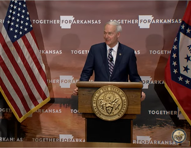 Arkansas Gov. Asa Hutchinson speaks during a news conference Wednesday, Oct. 14.