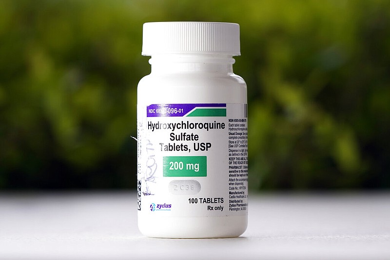 FILE - This Tuesday, April 7, 2020, file photo shows a bottle of hydroxychloroquine tablets in Texas City, Texas.