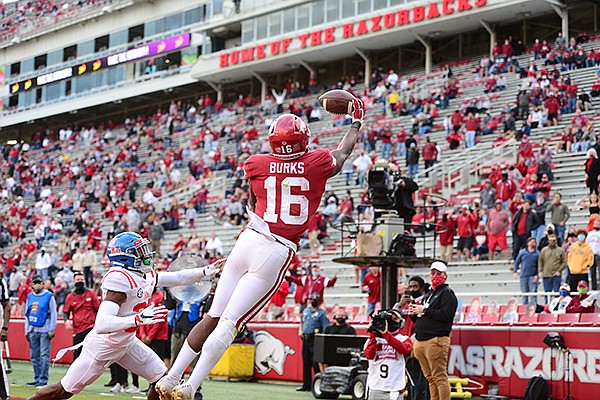 Arkansas receiver Treylon Burks (16) catches a touchdown pass during the fourth quarter of a game against Ole Miss on Saturday, Oct. 17, 2020, in Fayetteville. 