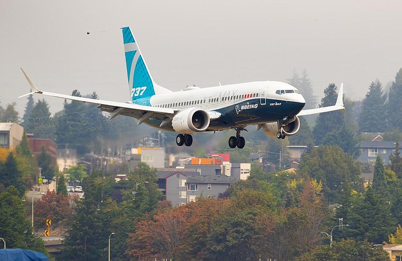 A Boeing 737 Max lands at Boeing Field in Seattle after a test flight in September. The European Union Aviation Safety Agency is preparing to draft an airworthiness directive for the Max that it expects to issue next month.
(The Seattle Times/Mike Siegel)