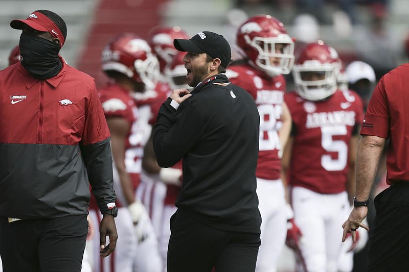 Arkansas offensive coordinator Kendal Briles reacts, Saturday, October 17, 2020 before the start of Arkansas' 33-21 win over Ole Miss at Donald W. Reynolds Razorback Stadium in Fayetteville. Check out nwaonline.com/201018Daily/ for today's photo gallery. 
(NWA Democrat-Gazette/Charlie Kaijo)

