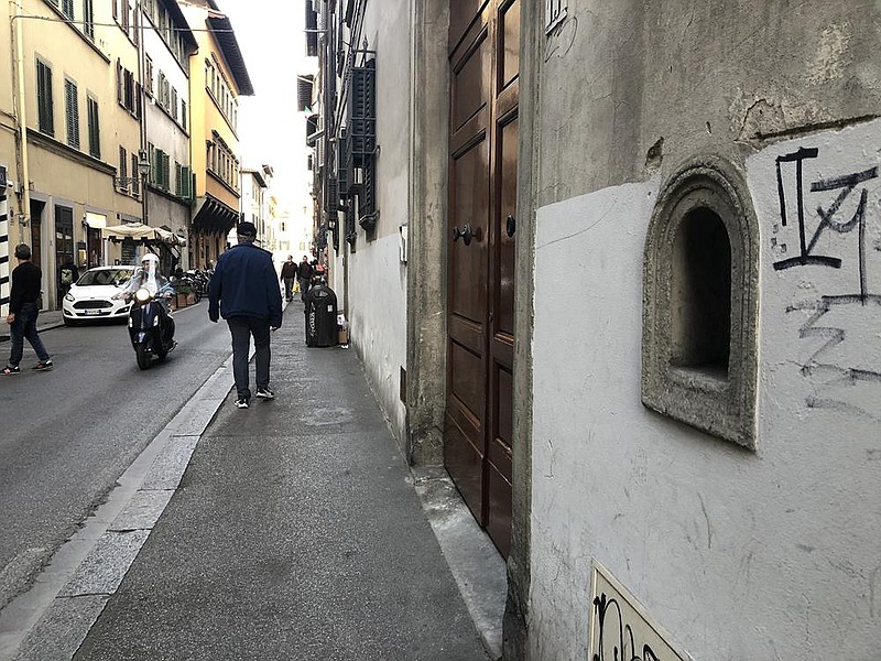 The merchants of Florence, Italy, built “wine windows” like the one at right to reduce contact with customers as the plague swept over the city 672 years ago.
(The Washington Post/Chico Harlan)