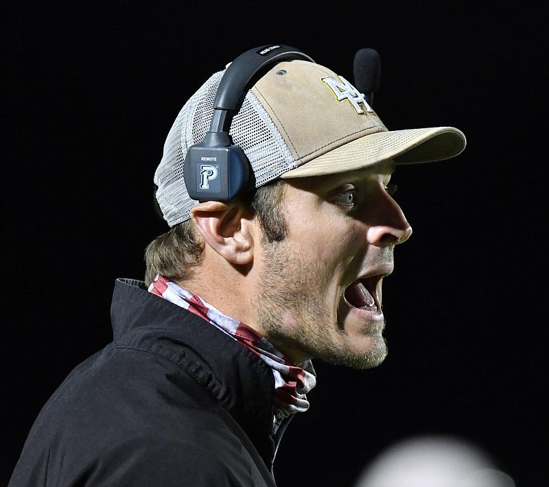 Mountain Home offensive coordinator Ryan Mallett shouts during the Bombers’ 35-7 loss at Benton on Friday night.
(Special to the Democrat-Gazette/Jimmy Jones)
