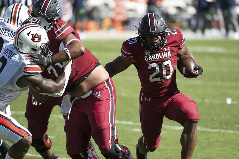 South Carolina running back Kevin Harris (20) eludes the Auburn defense Saturday to score a touchdown during the Gamecocks’30-22 victory over the No. 15 Tigers in Columbia, S.C.
(AP/Sean Rayford)