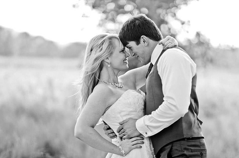 Julie Akins and Caleb Price were married on Sept. 14, 2013, just shy of one year after their first date. “People tease us. They say, ‘Y’all act like you’re still on your honeymoon,” Julie says. “We laugh a lot.” (Special to the Democrat-Gazette/Lori Sparkman Photography) 