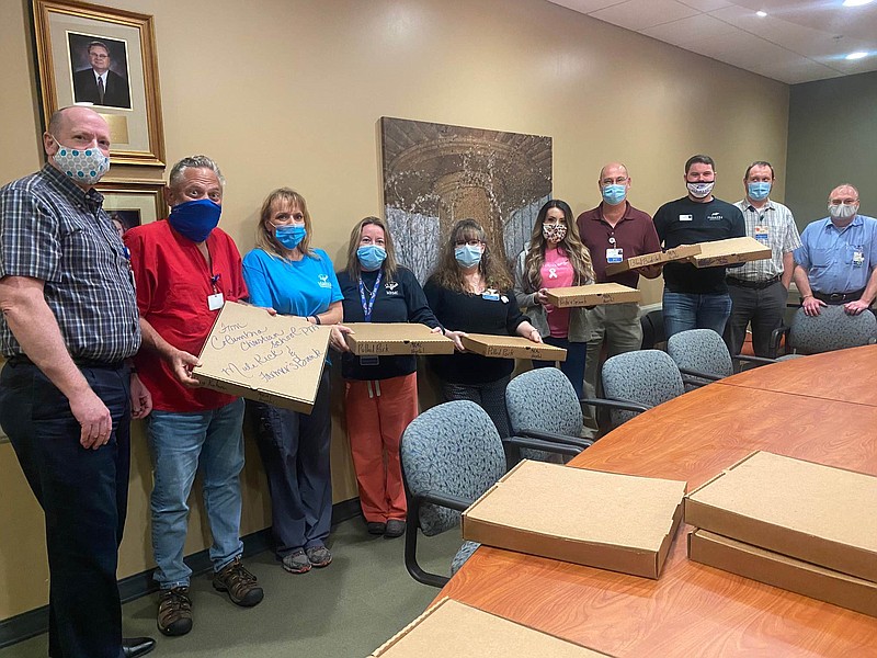 Magnolia Regional Medical Center received Mule Kick pizza as part of Columbia Christian School PTA’s Save the Light Campaign. The Columbia Christian School PTA, Mule Kick and Magnolia Farmer’s Bank.