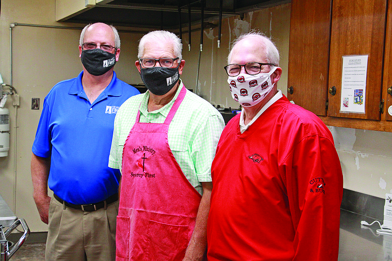 From left, Jeff Jackson, senior pastor at Searcy First United Methodist Church; David Morris; and Philip Williams stand in its kitchen. The church will host a Fish Fry Fundraiser on Oct. 24 for both lunch and dinner to raise money for Searcy FUMC’s feeding ministry, which provides meals for the homeless.