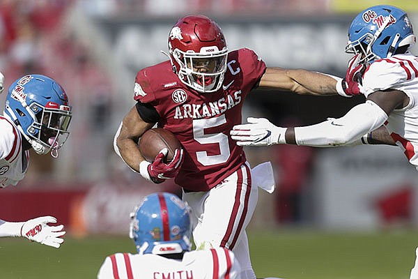 Arkansas running back Rakeem Boyd carries the ball during a game against Ole Miss on Saturday, Oct. 17, 2020, in Fayetteville.