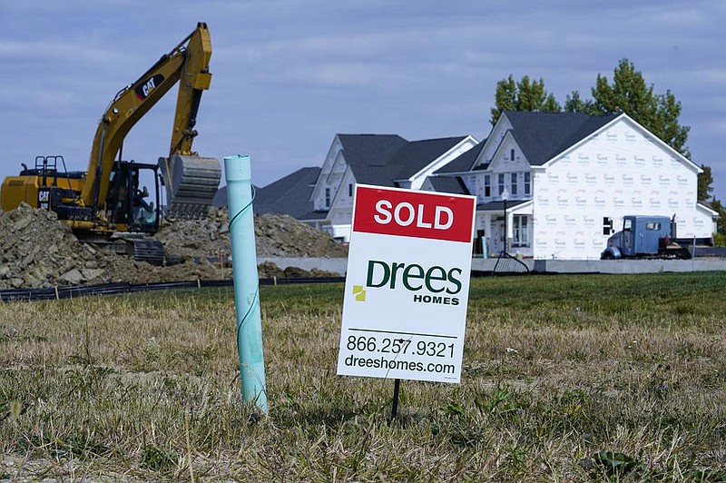 A “sold” sign sits on a lot as new home construction continues in Westfield, Ind., in September. U.S. home construction rose 1.9% last month after having fallen in August. (AP/Michael Conroy) 