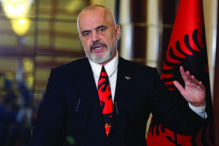 Albanian Prime Minister Edi Rama makes a statement with the Greek Foreign Minister Nikos Dendias after their meeting Tues- day in Tirana. (AP/Hektor Pustina) 
