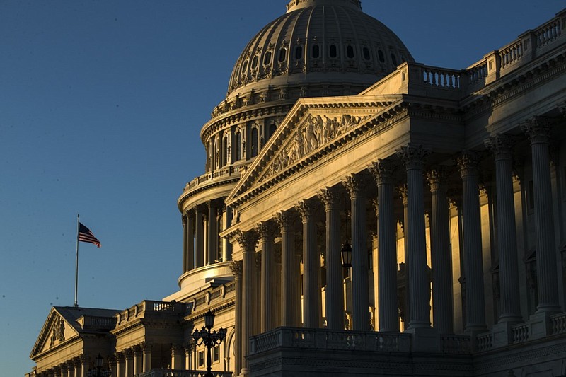 The U.S. Capitol building is illuminated by the rising sun on Capitol Hill in Washington in this Dec. 18, 2019, file photo. (AP Photo/Matt Rourke, File)