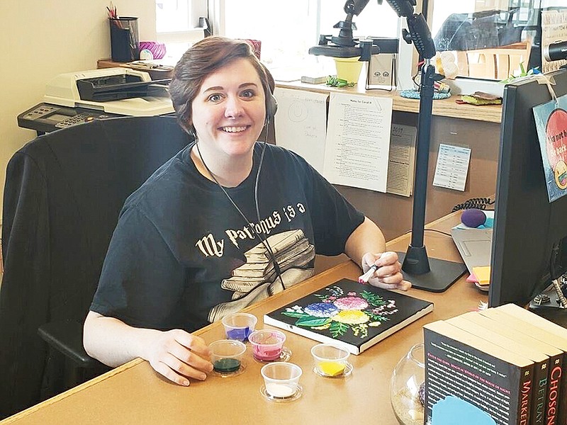 Kirsten Seidel, the young-adult/adult-services librarian for the Cabot Public Library, prepares to record one of her Painting With a Librarian programs for the library. The class is offered each month, with the next class scheduled for 2 p.m. Tuesday.