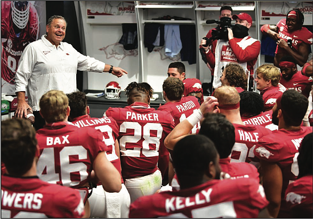 Arkansas Coach Sam Pittman addresses his players in the locker room after Saturday’s victory over Ole Miss at Reynolds Razorbacks Stadium in Fayetteville. At 2-2, the Razorbacks are one of the surprises in the SEC.
(University of Arkansas/Walt Beazley)