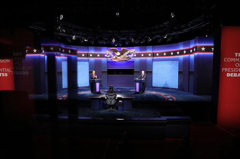 President Donald Trump and former Vice President Joe Biden face off Thursday night at Belmont University in Nashville, Tenn., in substantive exchanges on a range of topics helped by a mute button keeping order. More photos at arkansasonline.com/1023nashville/.
(The New York Times/Amr Alfiky)