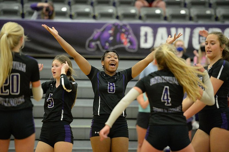 Fayetteville's Rosana Hicks (8) celebrates Thursday, Oct. 22, 2020, with teammates during the Bulldogs' win over Fort Smith Southside in the 6A-West Conference Volleyball Championships in Bulldog Arena in Fayetteville. Visit nwaonline.com/201022Daily/ for today's photo gallery. 
(NWA Democrat-Gazette/Andy Shupe)